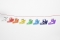 Regenboog gel letters boten TICKIT